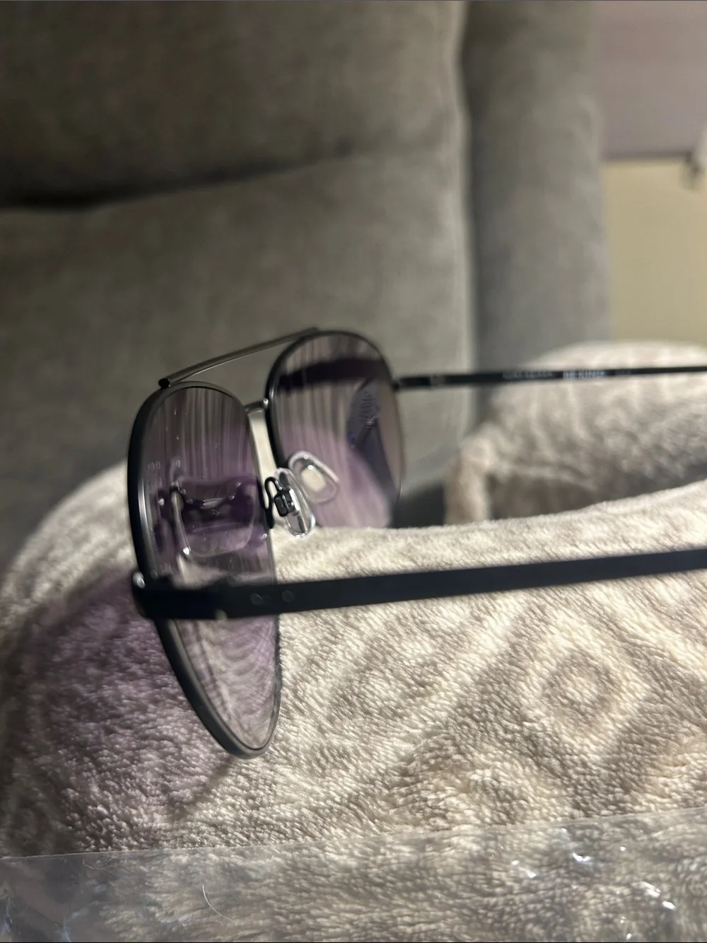 Kurt Geiger Black Frame Sunglasses with Purple Lenses